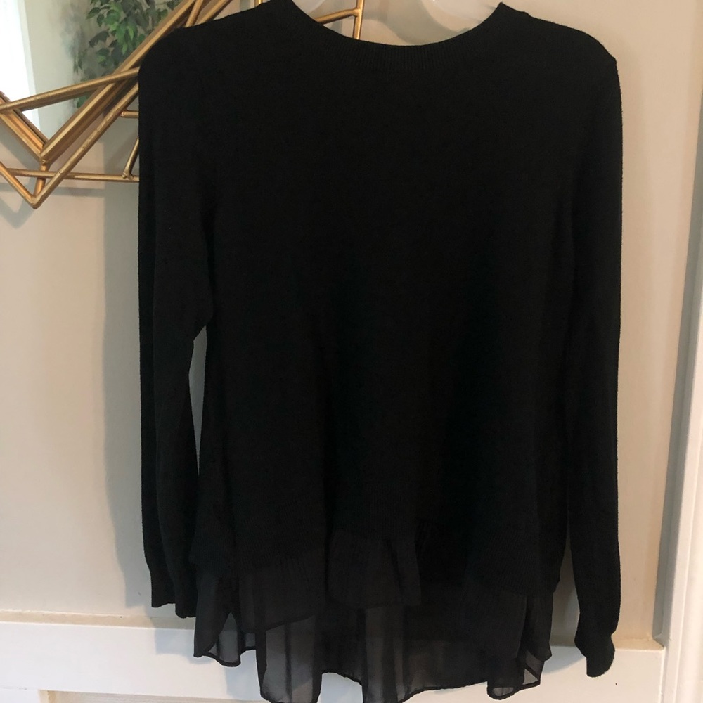 Black sweater with sheer underlayer